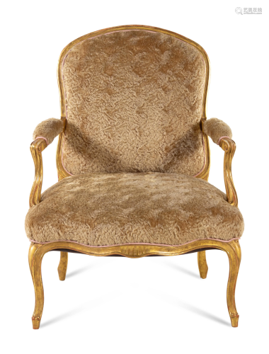 A Louis XV Style Giltwood Fauteuil Height 43 1/2 x