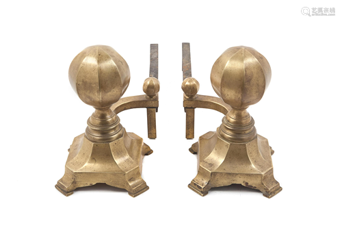 A Pair of Brass Andirons Height 12 inches.