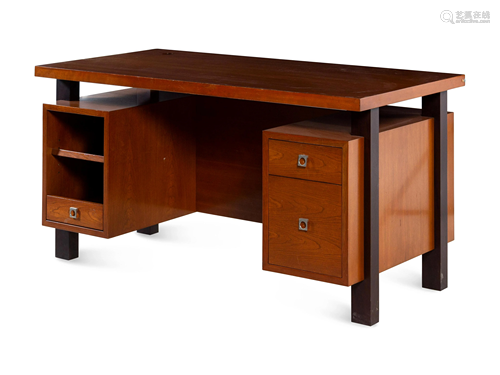 A Knowlton Bros. Walnut Desk with Ebonized Supports