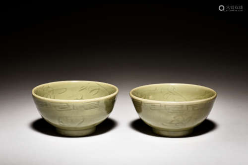 PAIR OF CELADON GLAZED AND CARVED BOWLS