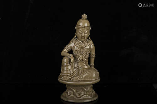 YAOZHOU WARE CARVED GUANYIN SEATED FIGURE