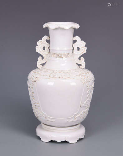 WHITE GLAZED AND CARVED VASE WITH CHILONG HANDLES
