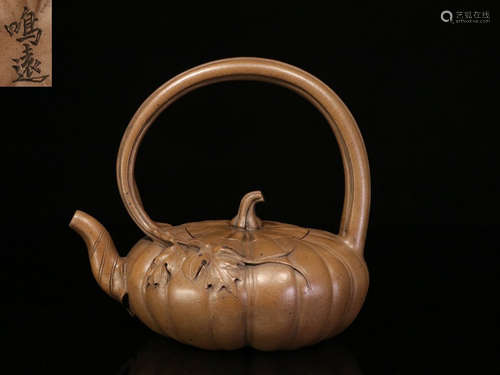 YIXING ZISHA COMPRESSED 'PUMPKIN' TEAPOT WITH LIFTING HANDLE