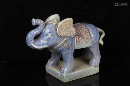 WUCAI GLAZED 'ELEPHANT' STANDING FIGURE