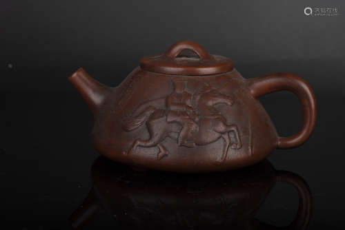 YIXING ZISHA CARVED 'HORSE RIDER' TEAPOT