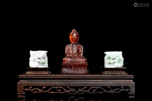 AMBER CARVED BODHISATTVA AND PAIR OF JADE CARVED LIONS