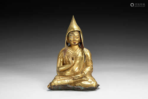 GILT BRONZE CAST 'LAMA' SEATED FIGURE