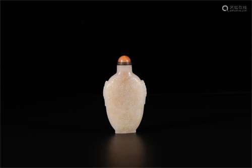 A Chinese Carved Jade Snuff Bottle