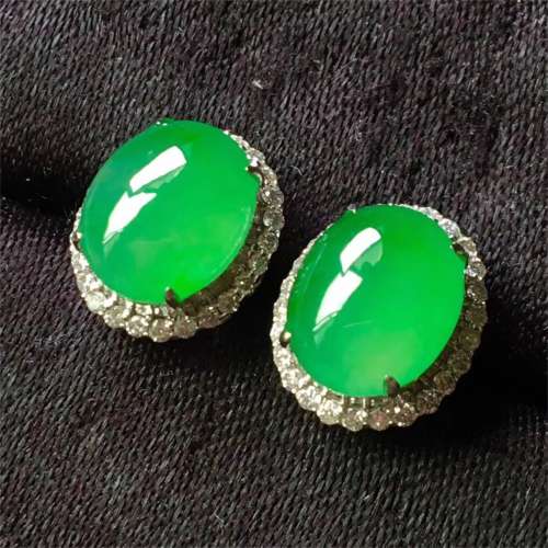 A Pair of Chinese Carved Jadeite Earrings