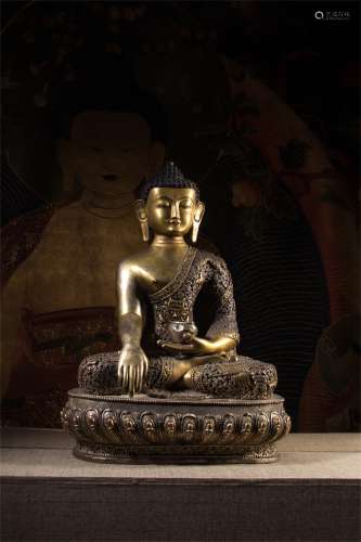 A Chinese Gilt Bronze Figure of Buddha