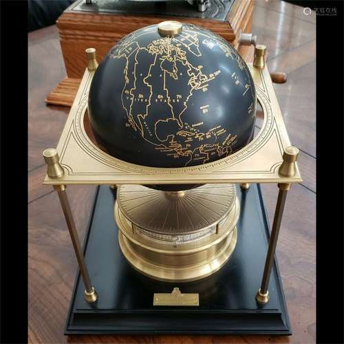 A British Royal Geographical Globe-Shape Clock