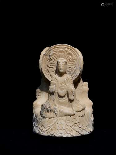 A Chinese Carved Stone Figure of Buddha