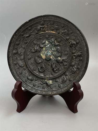 A Chinese Bronze Mirror