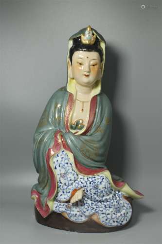 A Chinese Famille-Rose Porcelain Figure of Buddha
