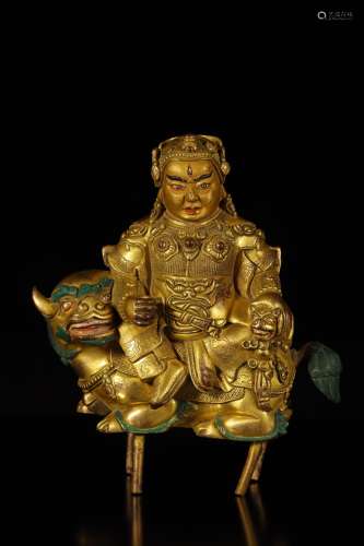 A Chinese Bronze Gilding Zambala Sitting Statue 