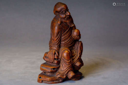A Chinese Carved Bamboo Arhat Statue