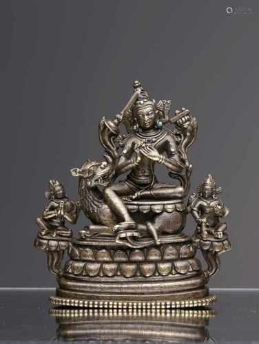 MANJUVARA ON LIONBronze with semi-precious stonesTibet or North-India , 12th century Pala