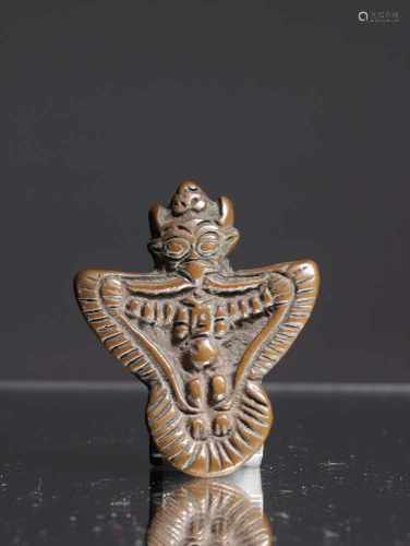 THOKCHA IN FORM OF GARUDABronzeTibet , 15th centuryDimensions: Height 5 cmWeight: 24 gramsSmall