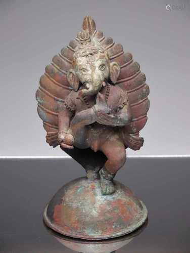 GANESHABronzeIndia 18th centuryDimensions: Height 21 cm ; Wide 12 cm ; Depth 12 cmWeight: 1358