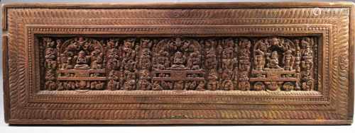 BOOK COVER WITH INSCRIPTIONSWood gilt and partly painted,Tibet, 17th centuryDimensions: Height 25 cm