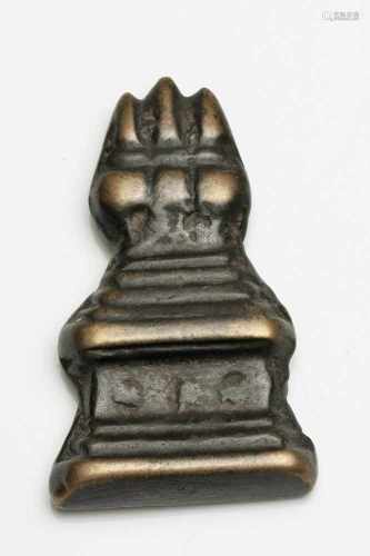 THOKCHA IN FORM OF A STUPABronzeTibet , 14th centuryDimensions: Height 4 cmWeight: 18 grams