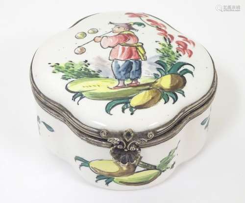 A Continental enamel box of trefoil form with a hinged lid and hand painted decoration.