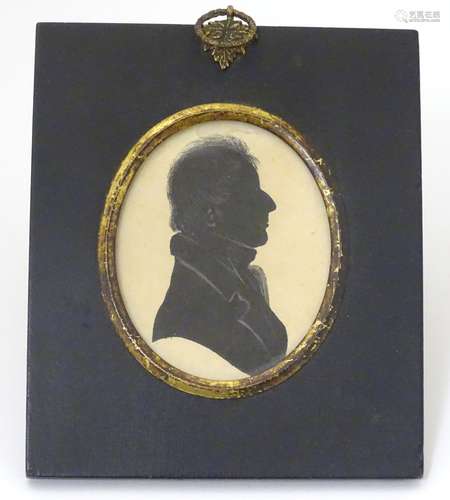 A 19thC miniature silhouette portrait of a gentleman with pencil highlights. Image approx.