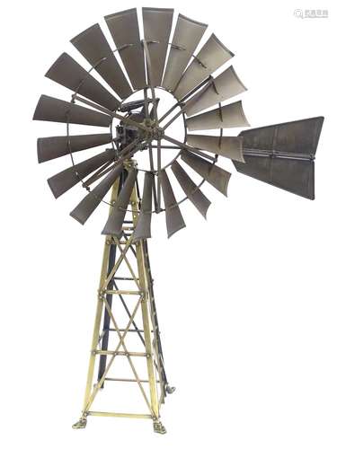 A 20thC American brass articulated model / salesman's sample of an Aermotor windmill with a ladder