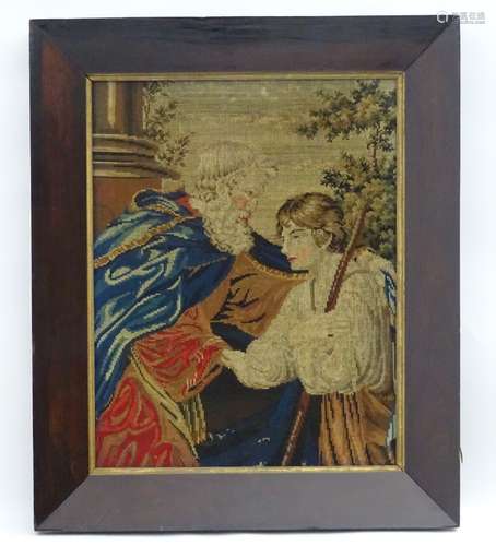 A Victorian wool work depicting a gentleman and a young figure with staff, in a rosewood frame, c.