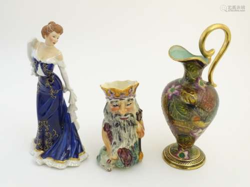 Three assorted ceramic items comprising a Belgian ewer / vase decorated with natural forms by