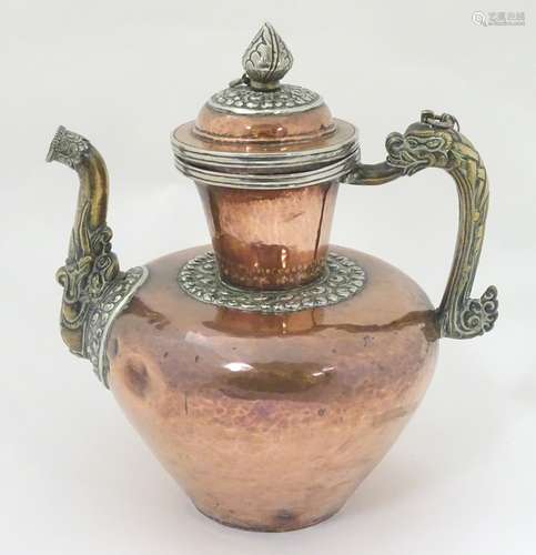 Decorative Metalware: A 19thC / 20thC lidded copper kettle with ornate silver plate mounts,