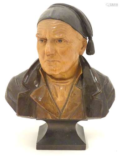 A 19thC carved wooden bust of a Sicilian fisherman on a squared tapering socle. Approx.