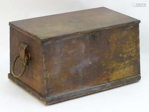 A 19thC mahogany trunk with rope handles to each side,