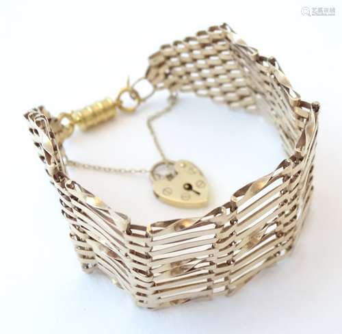 A 9ct gold wide link bracelet. Approx.