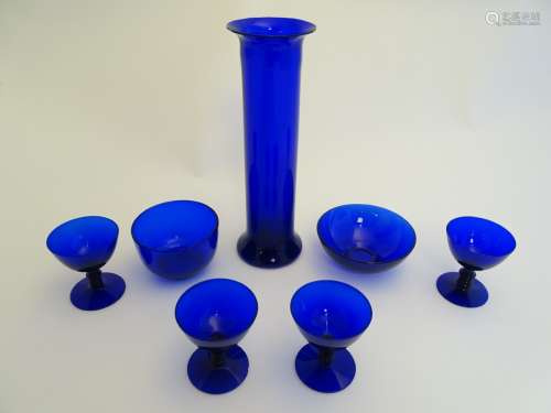 7 assorted items of blue glass comprising drinking glasses, dish, vase etc.