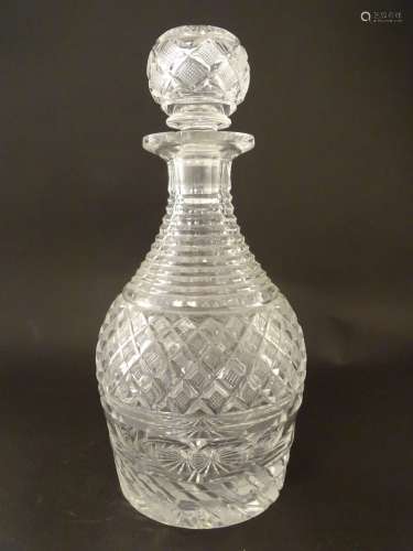 A cut glass decanter with banded decoration 10 1/4