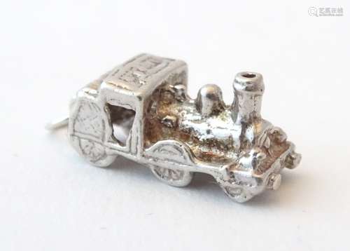 A novelty silver pendant charm formed as a steam train. Approx. 3/4