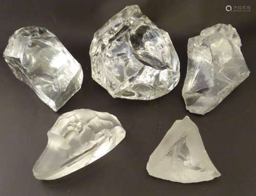 5 assorted rough cut glass specimens.