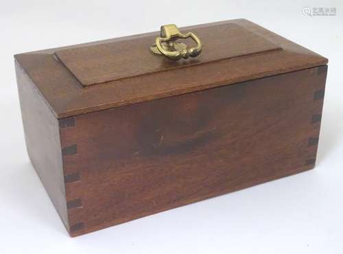 An early-to-mid 20thC mahogany storage box, with green baize lining and brass handle to the lid.