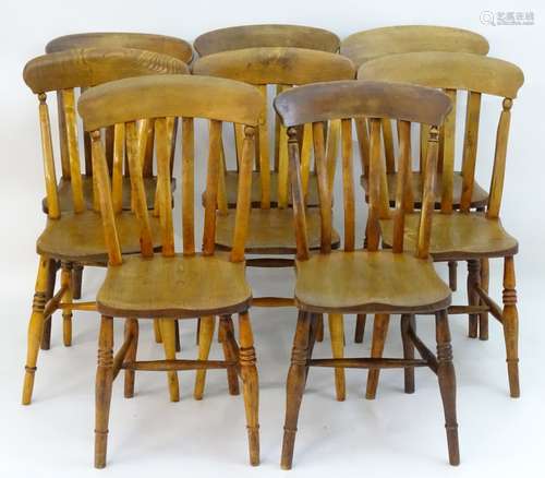 A set of eight lathe back Windsor dining chairs with curved top rails,