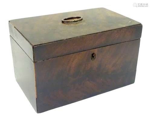 A 19thC mahogany two sectional box / caddy with an oval loop handle to top. Approx.