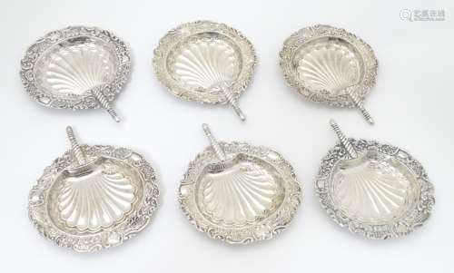 A set of 6 small dishes formed as fans with scallop, C-scroll and pierced decoration.