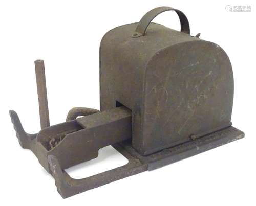 A Victorian cast iron clockwork fireside fan / fire bellows, marked Queen Fire Lighting Fan. Approx.