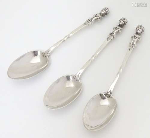A set of 3 Victorian silver teaspoons with caryatid decoration to handles.