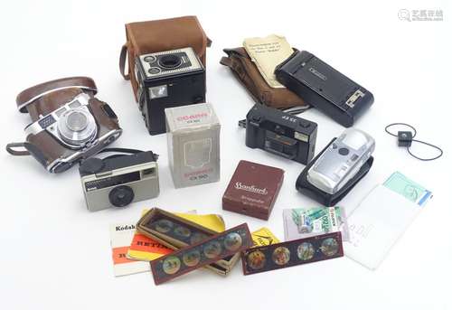 An assortment of vintage cameras and equipment, to include Kodak models 'Retinette IB' 35mm,