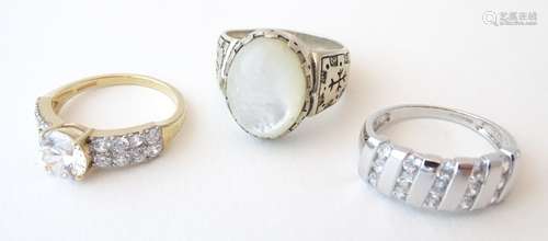 Three various rings, including a 14ct gold ring set with cubic zirconia,