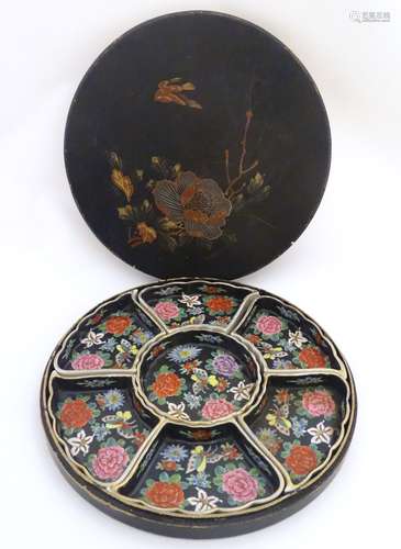 A Chinese 7 sectional hors d'oeuvre set of serving dishes decorated with stylised flowers and