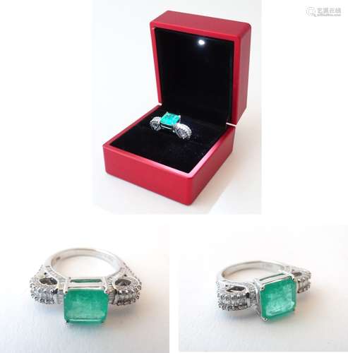 An 18ct white gold ring set with an octagonal cut emerald (2.65ct in size and measuring approx.