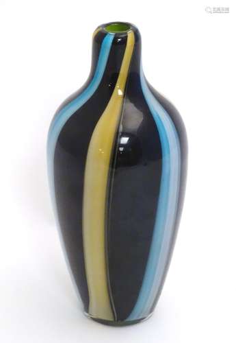 An art glass stripped glass bottle vase.