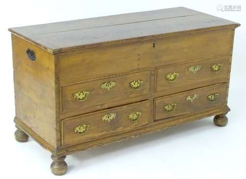 A late 18thC mule chest with a rectangular lid above two faux drawers and two short drawers with